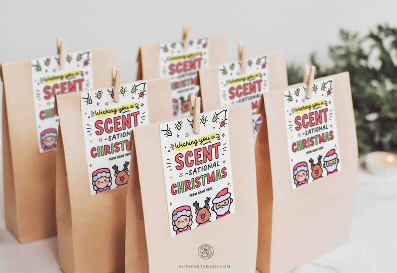 May include: A set of brown paper bags with colorful gift tags that say "Wishing you a Scent-sational Christmas". The tags feature cartoon illustrations of Santa Claus, a reindeer, and a girl.