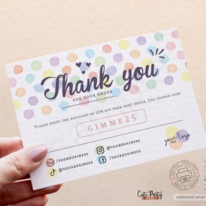 May include: A thank you card with a colorful polka dot pattern and the text "Thank you for your order." It includes a discount code "GIMME25" and social media icons.