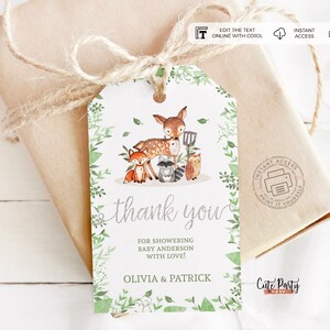 May include: Thank you tag with a woodland animal theme. The tag features a deer, fox, raccoon, and owl surrounded by green leaves. The text reads "Thank you for showering Baby Anderson with love! Olivia & Patrick".