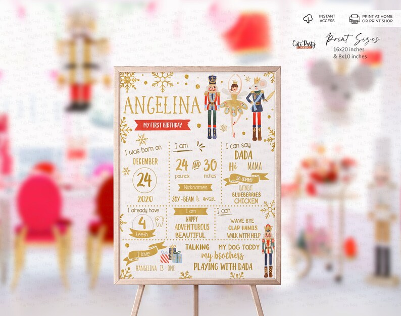 May include: A gold and white printable first birthday sign featuring a Nutcracker theme. The sign includes the name "Angelina" and details about her first year, including her birthdate, weight, height, and milestones.