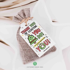 May include: A small burlap gift bag tied with twine, featuring a white tag with the text "THANK YOU FOR EVERYTHING YOU DO!" and a cartoon Christmas tree and wreath. The tag includes space for a name and the words "we truly appreciate YOU!"