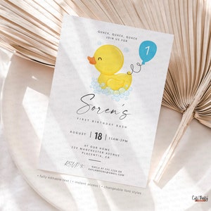 May include: A printable first birthday party invitation featuring a yellow rubber ducky with a blue balloon. The invitation says "Soren's First Birthday Bash" and includes the date, time, and location of the party. RSVP information is also included.