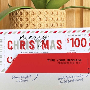 May include: A Christmas gift certificate with the words "merry CHRISTMAS" in red and gray. The certificate is for $100 and includes space to write a message. The design has red and white striped borders and a red pocket.