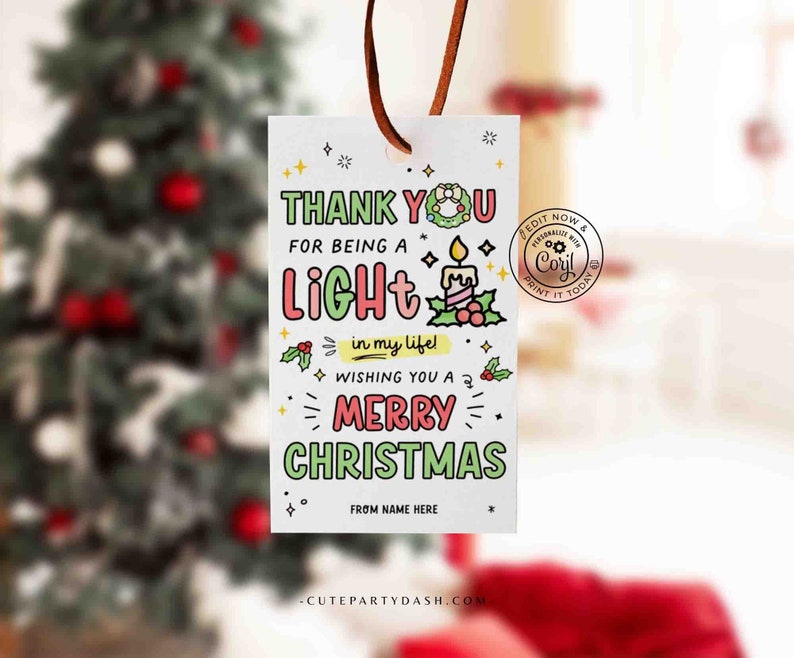May include: A colourful Christmas gift tag with the text "Thank you for being a light in my life! Wishing you a Merry Christmas." The tag has a festive design with a candle, holly, and a wreath. The text "From Name Here" is at the bottom of the tag.