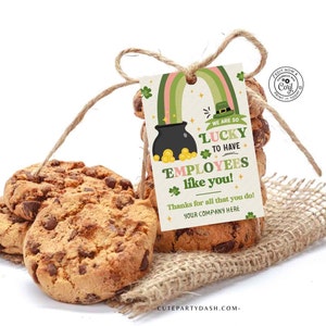 May include: A green, gold, and pink printable gift tag with a pot of gold, rainbow, and shamrock design. The tag reads "We are so lucky to have employees like you! Thanks for all that you do! Your company here."