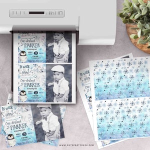 May include: Printable party invitation featuring a penguin with a blue and white winter wonderland background. The invitation says "It will snow much fun! One-derland Parker".