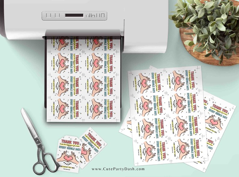 May include: Printable thank you tags with a pink heart and the text "Thank You! You made this party every single bit special!" in a colorful font. The tags are printed on white paper and are ready to be cut out.