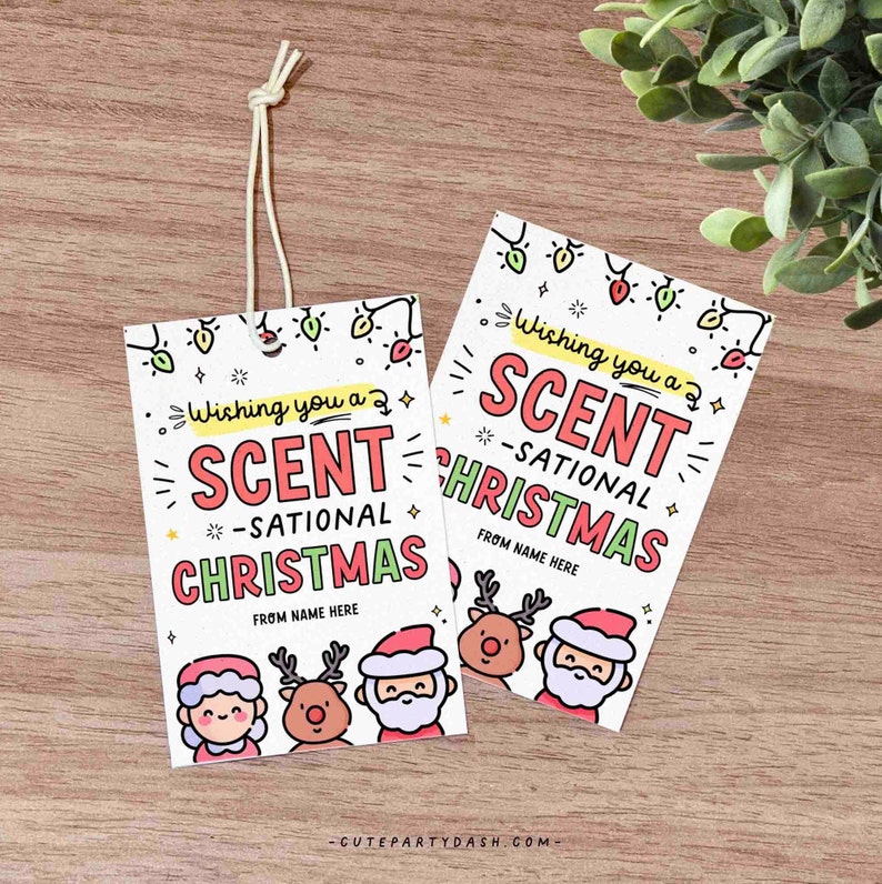 May include: Two white gift tags with a red and green Christmas theme. The tags feature the text "Wishing you a Scent-sational Christmas" with a cartoon reindeer and Santa Claus. The tags are tied with a white string.