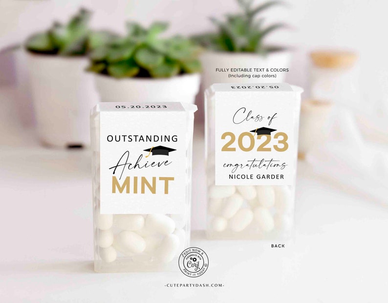 May include: Two small white boxes of mints with graduation themed labels. The left box has a black graduation cap and gold text that says "Outstanding Achieve Mint". The right box has a gold graduation cap and gold text that says "Class of 2023 congratulating Nicole Garder".