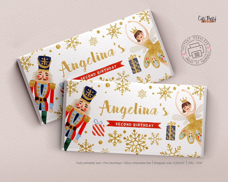 May include: Printable chocolate bar wrapper featuring a watercolour illustration of a nutcracker and a ballerina with gold snowflakes and glitter. The text "Angelina's Second Birthday" is printed on the wrapper.
