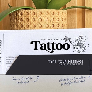 May include: A white and black gift certificate for a tattoo with the text "You are getting a Tattoo" and a small illustration of an anchor with the text "Get Inked". The certificate has a black strip at the bottom with the text "Type your message or delete this text".
