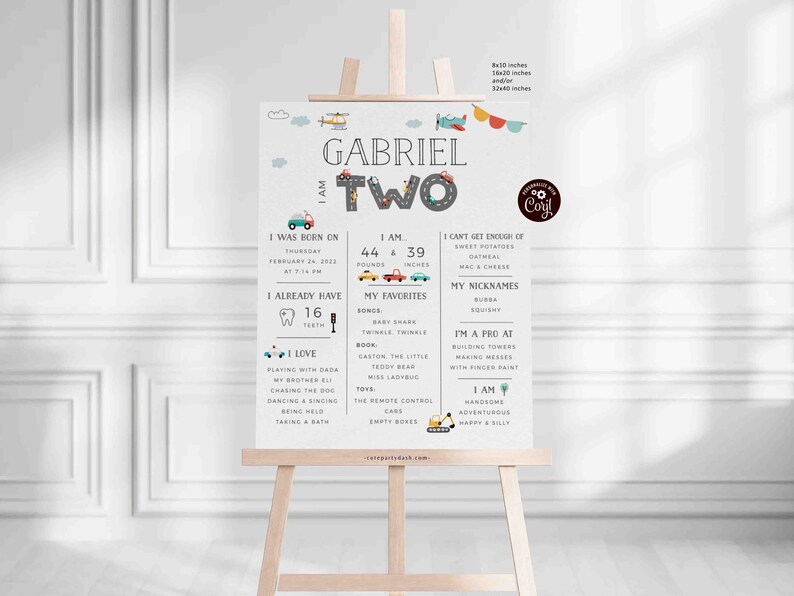 May include: A white printable birthday sign with a gray and white car theme. The sign says "Gabriel is Two" and includes details about the child's age, weight, height, favorite foods, and more.