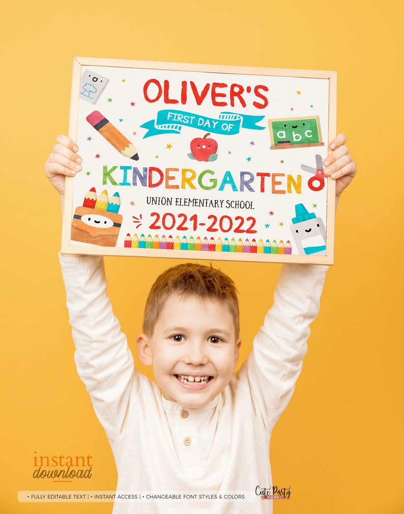 May include: A colorful printable sign for a child's first day of kindergarten. The sign features a chalkboard background with a white frame, a red apple, a pencil, a pair of scissors, and a stack of colorful crayons. The sign says "Oliver's First Day of Kindergarten" and "Union Elementary School 2021-2022".