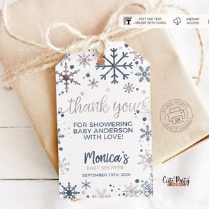 May include: A white thank you tag with a snowflake design and the text "Thank you for showering Baby Anderson with love! Monica's Baby Shower September 19th, 2020".
