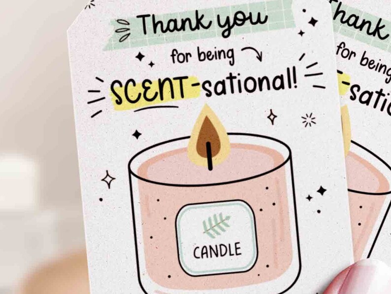 May include: A thank you card with a pink and white candle illustration. The card says "Thank you for being SCENT-sational!"