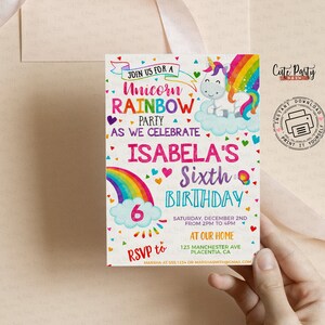 May include: A vibrant invitation for a unicorn-themed birthday celebration. The design includes a rainbow, a unicorn, and the text "Unicorn Rainbow Party" and "Isabela's Sixth Birthday". The invitation is held by a hand.