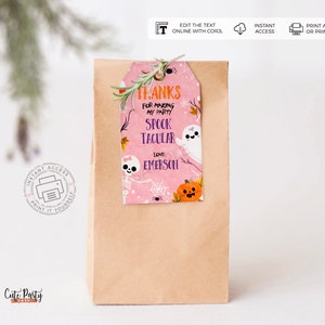 May include: Pink and purple Halloween party favor tag with a ghost, spider, and pumpkin. The tag says "Thanks for making my party Spooktacular. Love: Emerson".