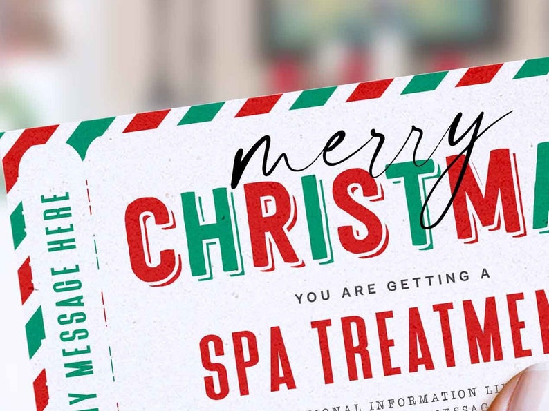 May include: A white gift certificate with red and green stripes at the top. The text "merry christmas" is in red and green letters with a black outline. The text "you are getting a spa treatment" is in red letters.