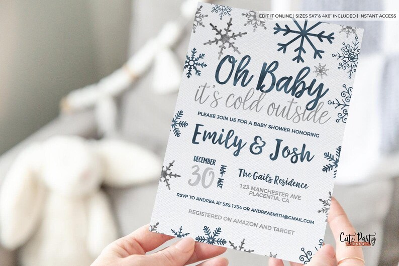 May include: A white baby shower invitation with blue snowflakes and the text "Oh Baby it's cold outside". The invitation is for Emily & Josh and is scheduled for December 30th at The Gails Residence.