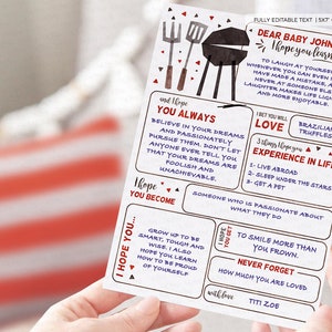 May include: A printable 5x7 card with a black and white illustration of a grill and grilling utensils. The card has a message for a baby, "Dear Baby Johnson, I hope you learn to laugh at yourself whenever you can, even if you have made a mistake, and never at someone else. Laughter makes life lighter and more enjoyable." The card also includes the text "I hope you become someone who is passionate about what they do." and "I hope you get to smile more than you frown. Never forget how much you are loved. With love, Titi Zoe."
