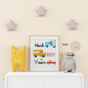 May include: A printable wall art design featuring a yellow school bus, a red pickup truck, and a blue cement mixer. The text on the print reads "Honk Beep Vroom".