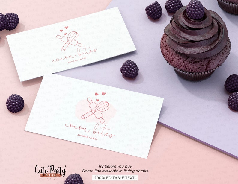 May include: Two white business cards with a pink watercolor background and a pink line drawing of a rolling pin and whisk with the text "cocoa bites artisan cakes". The cards are on a pink and purple surface with a chocolate cupcake and blackberries.