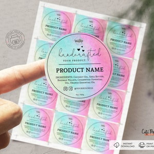 May include: A set of 9 printable labels with a watercolor background in shades of pink, blue, and green. The labels feature a circle with the text "handcrafted" and "your product" in black. The labels also include the text "product name" and space for additional information.