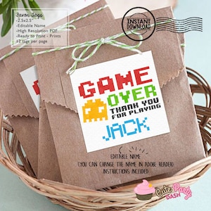 May include: Printable Game Over party favor tags with a pixelated Pac-Man character and the text "Game Over Thank You for Playing" with a customizable name. The tags are 2.5 inches by 2.5 inches and are available for instant download.