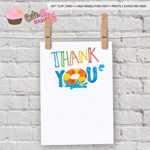 May include: A white card with the words "THANK YOU" in colourful, playful lettering. The "O" in "YOU" is a life preserver. The card is held by two wooden clothes pegs against a white brick wall.