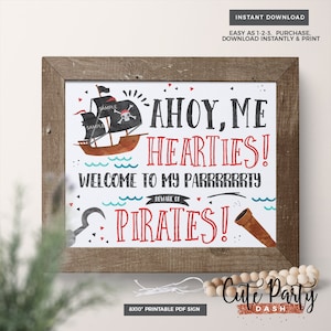 May include: Printable 8x10 inch sign with a pirate ship, skull and crossbones, and the text "Ahoy, Me Hearties! Welcome to my Parrrrrrrty Beware of Pirates!"  The sign is framed in a brown wood frame.