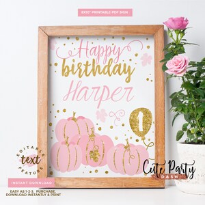 May include: Printable 8x10 inch sign with a pink and gold pumpkin theme. The sign says "Happy birthday Harper" with a gold glitter number 1 balloon. The sign is perfect for a first birthday party.