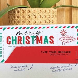 May include: A white gift voucher with a red and green striped border. The voucher says "SANTA'S GIFT VOUCHER" on the left side and "merry CHRISTMAS" in red and green letters on the top. The voucher has a red flap on the bottom with the text "TYPE YOUR MESSAGE OR DELETE THIS TEXT" and a small arrow pointing to the right. The voucher also has a small image of a star and the text "0000000. LAS VEGAS" on the right side.