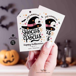 May include: Two printable gift tags with a witch hat and the text "Just a bunch of Hocus Pocus" and "Happy Halloween".