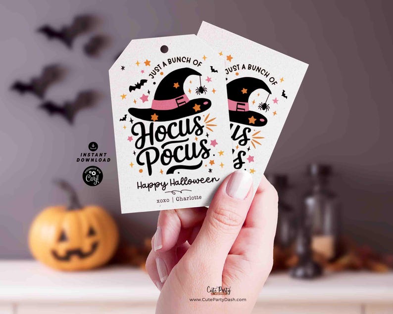 May include: Two printable gift tags with a witch hat and the text "Just a bunch of Hocus Pocus" and "Happy Halloween".