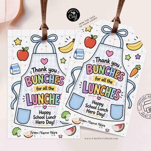 May include: Two gift tags with a light blue apron design, featuring the text "Thank you bunches for all the lunches." The tags include illustrations of fruits, vegetables, and milk cartons. Brown ribbon is attached to the top.