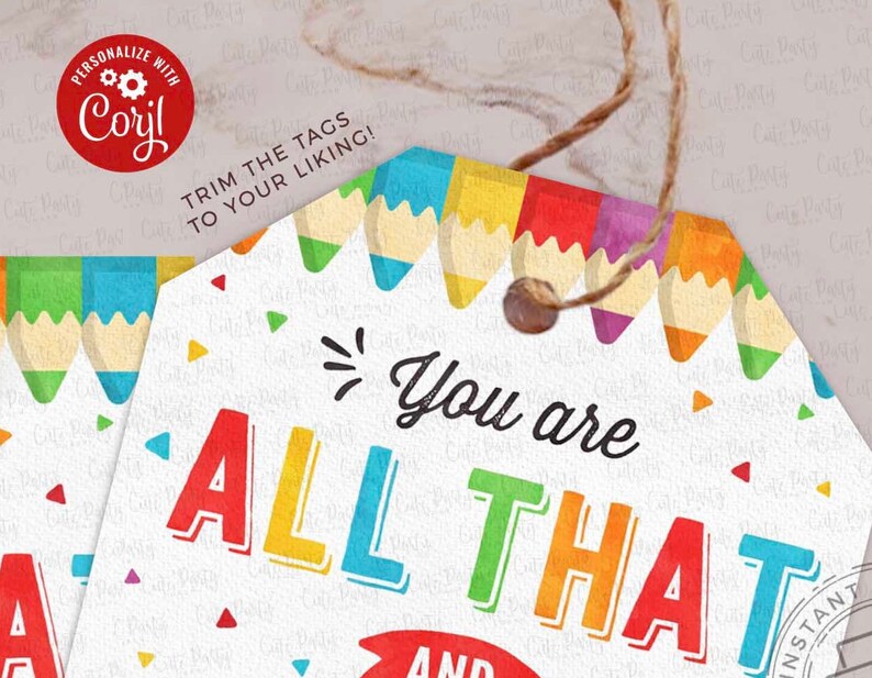 May include: A colourful gift tag with the text "You are all that and a bag of chips" with a row of colourful pencils at the top. The tag is trimmed with a brown string.