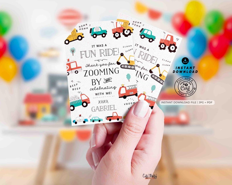 May include: A set of three thank you cards with a construction vehicle theme. The cards are white with colorful illustrations of trucks, bulldozers, and fire trucks. The text on the cards reads "It was a fun ride! Thank you for zooming by and celebrating with me! XOXO, Gabriel".