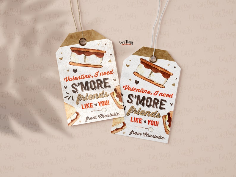 May include: Two white gift tags with brown string. The tags feature a watercolor illustration of a s'more with the text "Valentine, I need S'MORE friends LIKE YOU! from Charlotte".