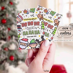 May include: A printable Christmas gift tag with a white background and colorful cartoon illustrations. The tag says "Wishing you a Ho Ho Ho full of Ha Ha Ha" and has a space to write "From Name Here".
