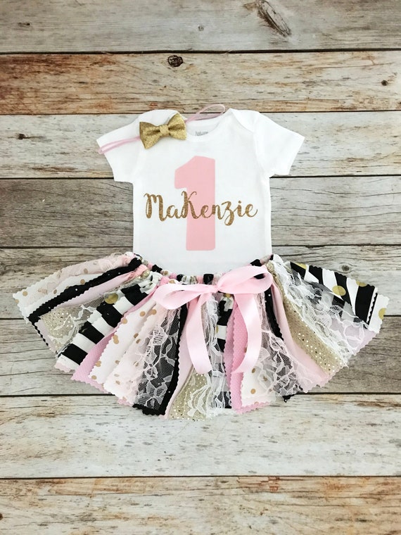 pink black and gold outfit