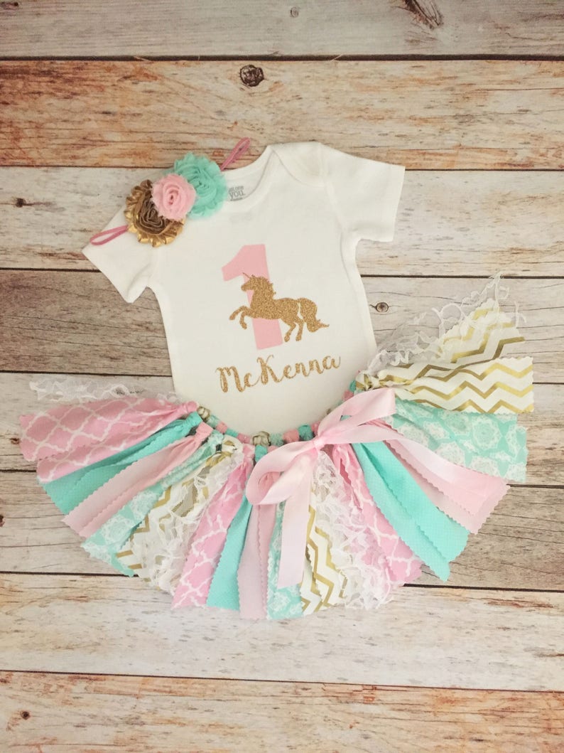 mint and gold outfit