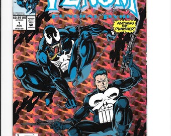 May include: A Marvel Comics Venom Funeral Pyre issue 1 comic book featuring Venom and The Punisher on the cover. The artwork shows Venom in a black suit with a white spider emblem and The Punisher with a white skull emblem, both holding weapons.
