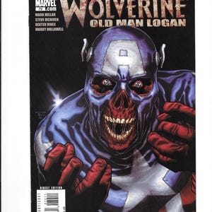 May include: Comic book cover for Wolverine: Old Man Logan. The artwork depicts a zombie-like figure in a Captain America-inspired costume. The figure has a blue cowl with a white "A" and red gloves. The Marvel Comics logo is at the top.