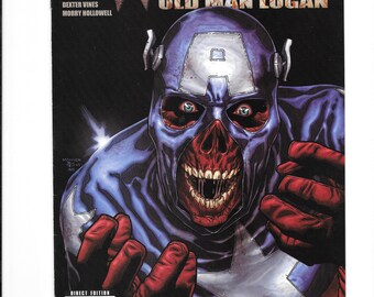May include: Comic book cover for Wolverine: Old Man Logan. The artwork features a grotesque, zombie-like figure in a Captain America-inspired costume. The figure has a blue cowl with a white "A" and red gloves. The Marvel Comics logo is at the top.