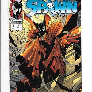 May include: A comic book cover titled Spawn issue 3, featuring a character in a black suit with a long, flowing orange cape standing on a rooftop. The cover displays the text Spawn, image, 3, AUG, $1.95, and $2.35 Canada, with bats flying in the background.