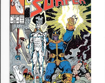 May include: A Marvel Comics Silver Surfer issue 55 comic book cover featuring Thanos with a glowing gauntlet, the Silver Surfer, and fallen heroes. The text reads The Silver Surfer, Infinity Gauntlet Crossover, 50 Years Captain America, and The Universe According to Thanos.