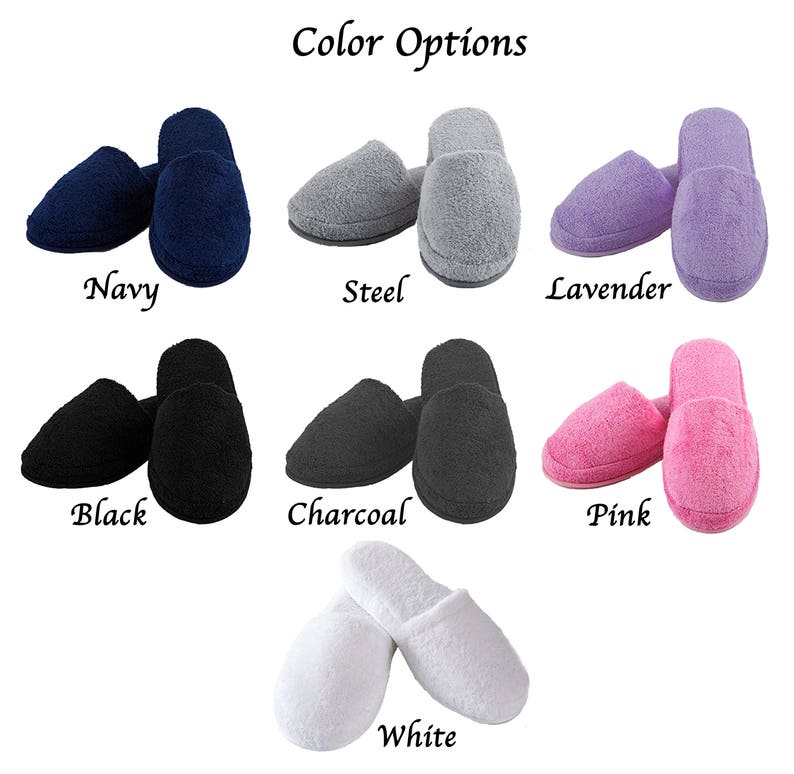 May include: A variety of colors of fuzzy slippers are shown. The colors include navy, steel, lavender, black, charcoal, pink, and white.