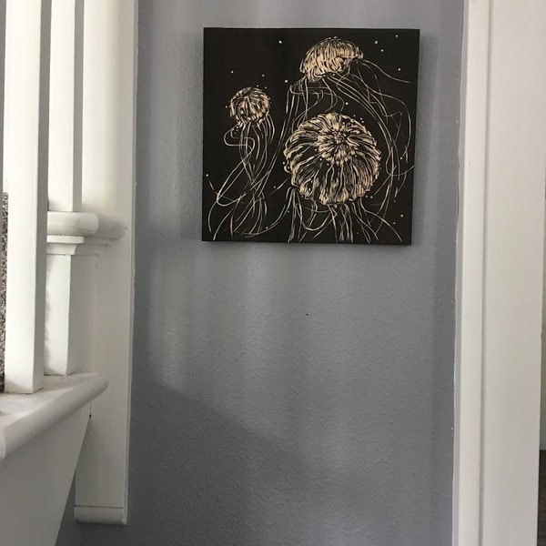 Hand-carved jellyfish on black-stained pine wood wall art // ocean // fish // woodcut // decor // carving // line art // rustic // hanger