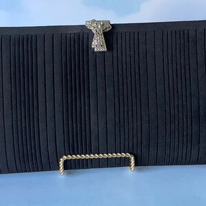 Four finger clutch bag deals