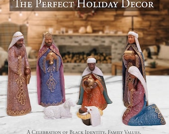 Puede incluir: Un conjunto de decoración navideña con figuras de los Reyes Magos, un cordero y el niño Jesús en un pesebre. Las figuras visten coloridas túnicas. El texto dice "The Perfect Holiday Decor" y "A Celebration of Black Identity, Family Values, and Timeless Christian Tradition."
